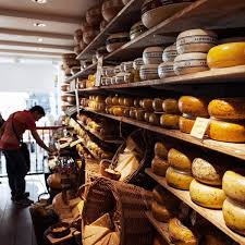 The main floor is a cheese shop with abundant samples laid out for noshing. Amsterdam Cheese Museum Cheese Amsterdam Food