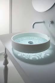 About 38% of these are bathroom sinks, 6% are basin faucets, and 20% are bathroom vanities. White Sleek Floating Bathroom Sink With Patterned Glass Bottom Glass Basin Sink Design Chic Bathrooms