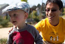 Parents, doctors and kids celebrate the fight against pediatric cancer