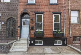 Rowhome Black Trim Red Brick Windowbox Shaker Style Cabinetry Custom Homes Flipping Houses
