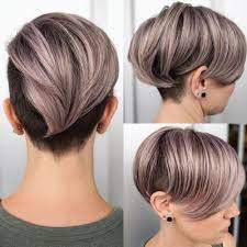 Here is a great example of working with your cowlicks at this length: 10 Step Guide To Growing Out A Pixie Cut With Trims And Styling Tips