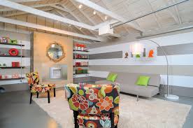 First, all of your walls should be one solid color if at all possible. Kerrie Kelly Design Lab Hgtv Room Crashers Garage Turned Lounge Kerrie Kelly Design Lab