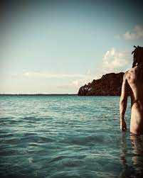 Lenny Kravitz poses nude in the ocean: 'New birth'