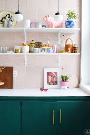 The only thing we had a problem with was early on before they cured for a few weeks, the so that's a peek into the kitchen cabinets with all the details. The Studio S Eclectic Bold Kitchen
