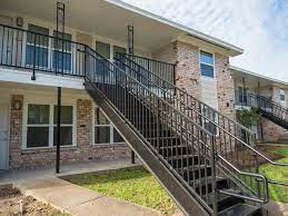 Staircase used for access to. Metal Exterior Apartment Stairs Installation Fire Escape Stairs Houston Aber Fence