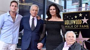 Michael douglas has told a crowd at a campaign event that one of the last statements from his father kirk was an endorsement of presidential the hollywood legend left an unrivaled mark on the film industry, but it appears he also left behind an odd political endorsement which his son is now touting. Michael Douglas Catherine Zeta Jones And Family Attend Kirk Douglas Funeral Entertainment Tonight