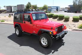Image result for Flame Red 2006 Jeep