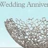 Your 25th wedding anniversary is the perfect time to present your wife with a beautiful diamond eternity band. 1