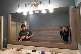 It does not have to be plain black. Diy Bathroom Mirror Frame For Under 10 Hello Hayley Blog