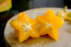 Slice off the two ends. How To Slice And Eat A Star Fruit Cheap Food Here