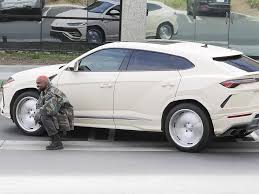 A new breed of fighting bull. Kanye S Custom Lamborghini Urus Is A Cream Colored Catastrophe Life Beyond Sport