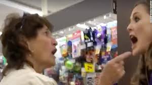 Two friends speaking Spanish were told to speak English. A bystander  stepped in to help