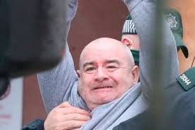 Caught in the act: Cops say grainy images show Lyra McKee murder accused  picking up bullet casings