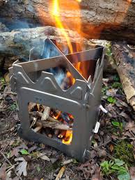Think eating while camping outdoors in the wild can only mean spooning beans out of a tin? A Portable Wood Stove That Actually Does The Job Ever Wild Outdoors