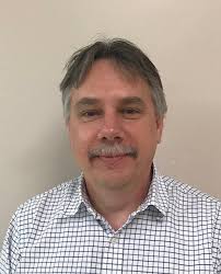 Coach Greg Molnar takes technical for Iroquois teen