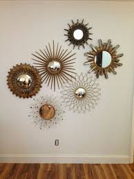 Revolution collection available in brass or painted metal. Miroir En Forme De Soleil En Metal Doree Parfait Pour Habiller Un Mur Blanc E Wallpaper Wallp Diy Wall Design Sunburst Mirror Wall Mirror Wall Art
