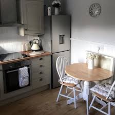 This circular pedestal table is just the thing to place in your kitchen nook, corner bar area, or even outside on a balcony or patio. Country Styled Small Kitchen Dining Table Chair Set In White And Oak Dining Table In Kitchen Dining Table Small Space Drop Leaf Table