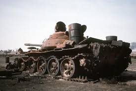 A burned-out Iraqi T-55 main battle tank lies abandoned at the edge of an  oil field following Operation Desert Storm - NARA & DVIDS Public Domain  Archive Public Domain Search