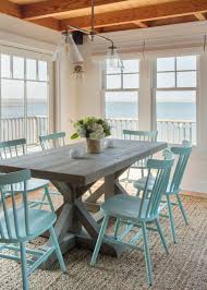 Although i call them modern coastal, i think they'd work just as well in dining rooms with traditional or transitional elements too. Coastal Dining Room With Beachy Blue Dining Chairs Hgtv