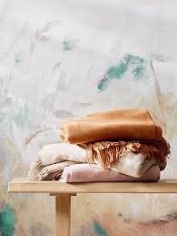 Some call it terracotta and others refer to it as whether a throw pillow or a vintage pottery vase, muted orange burnt oranges are also trending in bedding and can be paired with blue walls in bedrooms to create a calming, restful space. John Lewis Partners Plain Wool Throw
