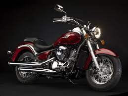 Sit down, stick out your left haunch, reach down and there's the key in a very accessible location. Vn900 Classic 2014