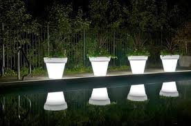 Hanging planters and brackets accommodate ferns and long, twining plants and pair beautifully with feeders and bird houses. New Inspiration Translucent Glowing Pots And Planters Vazon By Rolotuxe Modern Planters Outdoor Outdoor Planters Outdoor