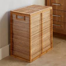 This hamper can hold up to 2.2 bushels of clothing and has a lightweight polyethylene construction to make transporting clothing from your bedroom to your laundry room and back simple. Pin By Julia Mercier On 4132 Laundry Laundry Hamper Bamboo Hampers Tall Storage Baskets