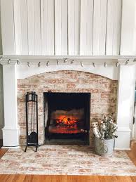 Cut to size using a wet saw (not shown). I Added Faux Brick Wallpaper To Our Fireplace The Wicker House