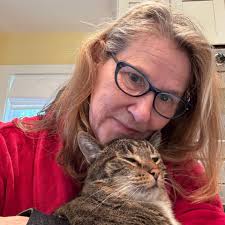 He's doing really good. The booger colored goo is gone, but this eye is  watery still. I figure 2 more days and I can let him loose. Yesterday he  started singing prison