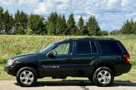 Image result for Brilliant Black 2003 Jeep