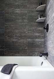 We've found this very useful for when reading books or just enjoying a glass of wine while taking a bath. Rustic Wood Like Tiles In Drop In Bathtub Cottage Bathroom