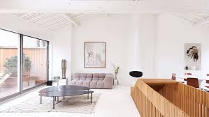 Coffee table, linea classica, living room. A Parisian Penthouse Embraces Its Architectural Heritage Yatzer
