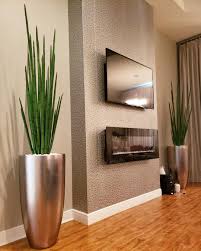 Cfa Design Group On Instagram Revolve Silver Planters With Snake Grass Fabulous In Any Room Of Your Home Artificialturf Snake In The Grass Planters Design