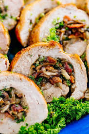 A Juicy And Easy Stuffed Pork Tenderloin Loaded With Mushrooms And Bacon This Pork Roulade Looks Fancy Pork Tenderloin Recipes Tenderloin Recipes Pork Roulade