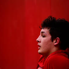 Through his father's death and battle with leukemia, wrestler Aidan  Halloran never gave up