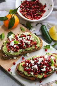 Avocado Toast With Pomegranate Salsa 13 Fancy Avocado Toasts That Are Totally Craveable Avocadotoast In 2020 Avocado Toast Recipe Toast Recipes Avocado Toast