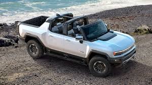The truck has removable roof panels that can be stored in the truck's front trunk. Gtp Cool Wall 2022 Gmc Hummer Ev