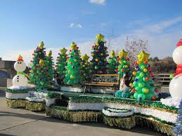 Parade float decorations and parade float decorating kits. Christmas Parade Float Ideas Float So Far My Guess It Was Her Favorite Float Still By Christmas Parade Christmas Float Ideas Christmas Balloons