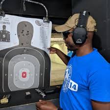 Bullseye shooting is a category of shooting sport disciplines where the objective is to score points by hitting a round shooting target as close to the center as possible with slow precision fire. Bullseye Indoor Range Gun Shop 41 Photos 73 Reviews Gun Rifle Ranges 221 W Crogan St Lawrenceville Ga Phone Number