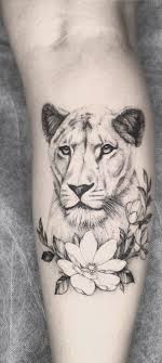 Roaring lion head tattoo on chest for men. 50 Eye Catching Lion Tattoos That Ll Make You Want To Get Inked Lioness Tattoo Lion Tattoo Female Lion Tattoo