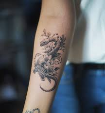 Popular designs include roses, skulls, eagles, hearts, and others. Snake And Flowers Forearm Tattoo Novocom Top
