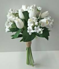 Pink and white tulips sway in a botanical garden on a sunny day. Latex White Tulip Wedding Bouquet Stephanotis Bridal Weddings Flowers Silk Fake Ebay