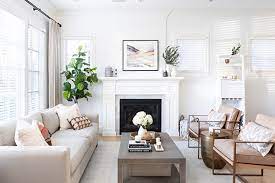 In order to optimize the functionality of your coffee table, place it 16 to 18 inches from the edge of the sofa and any other seating around the table. How This Dated Family Home Received A Fresh Modern Upgrade Coffee Table For Small Living Room Livingroom Layout Furniture Design Living Room