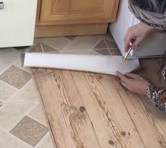 Apartment Friendly Faux Wood Floors With Contact Paper Flooring Faux Wood Flooring Diy Kitchen Flooring Diy Flooring