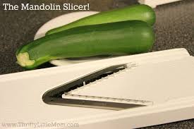 How to slice zucchini with a mandolin. How To Make Zucchini Noodles Thrifty Little Mom