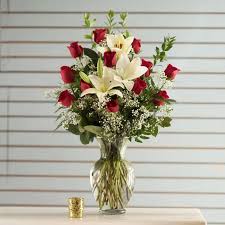 Send fresh & beautiful flowers to sunnyvale, designed by our local expert florists from roses, carnations, orchids and lilies for birthday, anniversary, sympathy, get well with same day delivery across usa. 12 Red Roses With Lilies By Paola S Flowers And Events