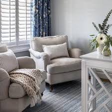 White sheer curtains are a good option for a room like this. White And Beige Curtains Design Ideas
