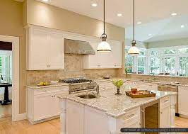 I think white cabinets are the best choice in the kitchen but just make sure they're easy to clean. Backsplash Com Best Kitchen Backsplash Ideas Top Trends Beige Kitchen Beige Backsplash Travertine Backsplash