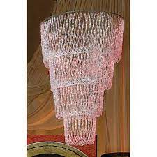 the exquisite beaded chandelier features four layers of white beads hanging from metal rings beaded chandelier prom decor prom themes