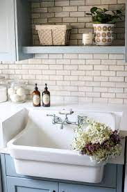 Let S Design A Dream House Together The Laundry Area The Enchanted Home In 2021 Blue Laundry Rooms White Beveled Subway Tile Blue Shelves